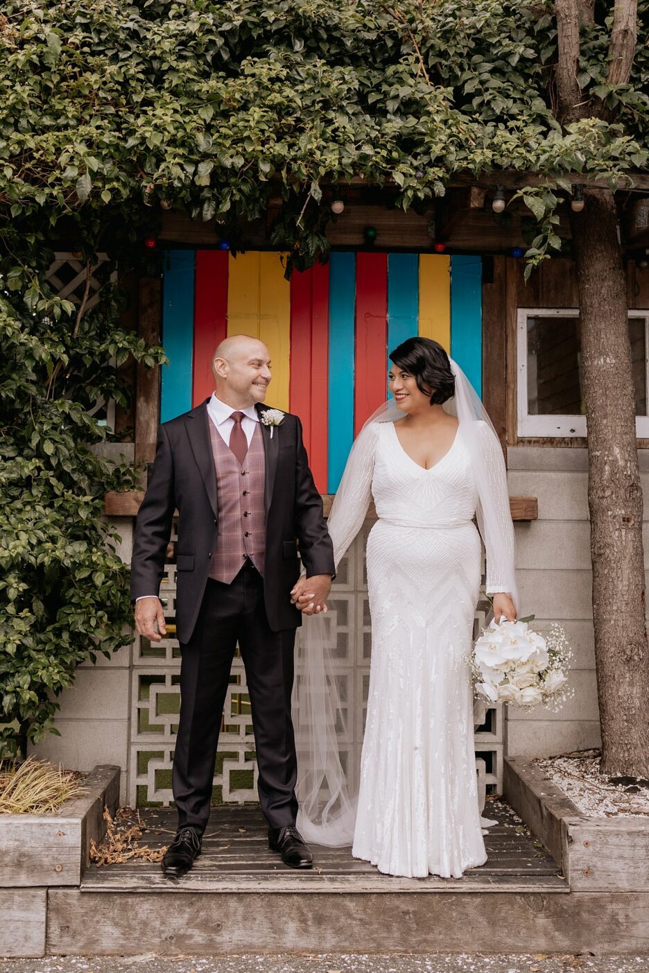 wedding photos in front of Astrolabe Mount Maunganui