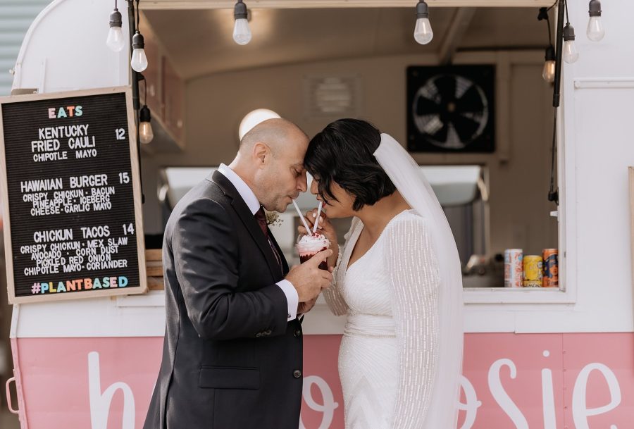 Bride and groom sharing icecream sundae