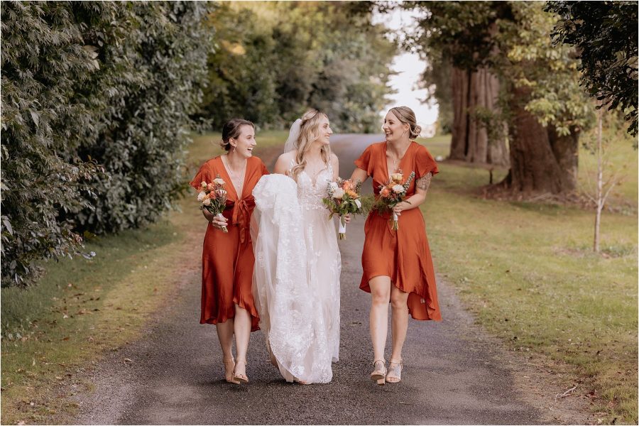 Bride in madilane dress and bridesmaids in petal and pup dresses