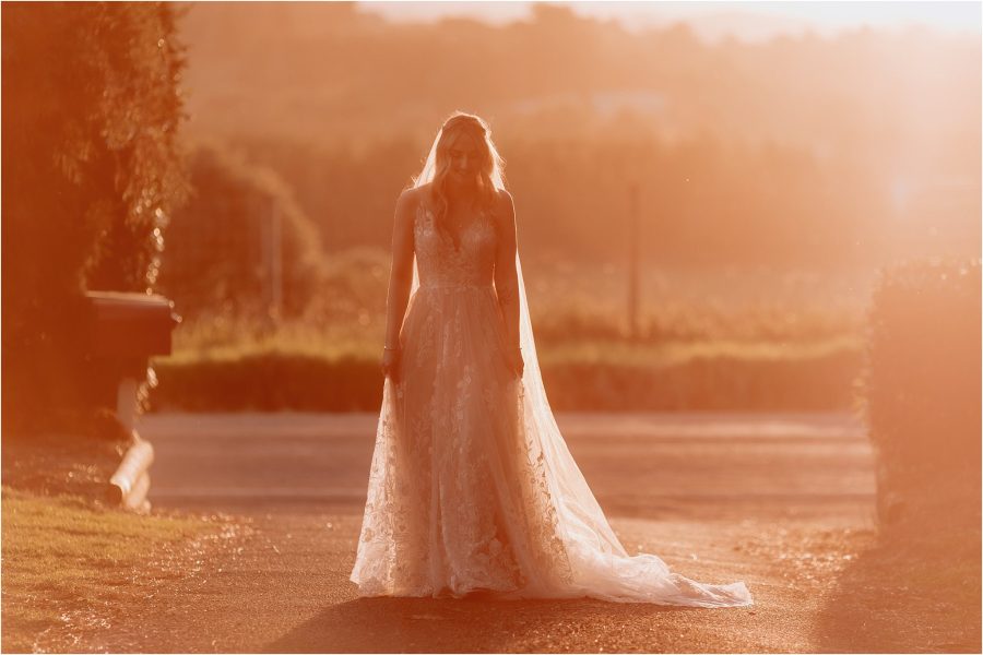 bride persimmon lane driveway at golden hour Tauranga