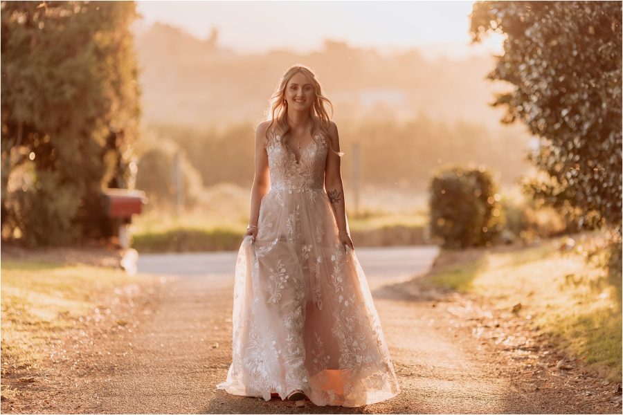 Relaxed bride walks in the sunshine tauranga New Zealand