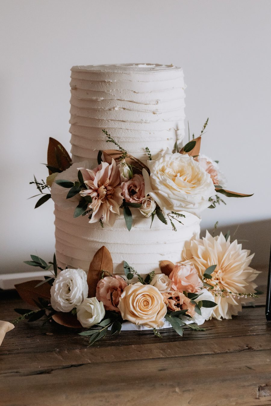 wedding cake with blush flowers