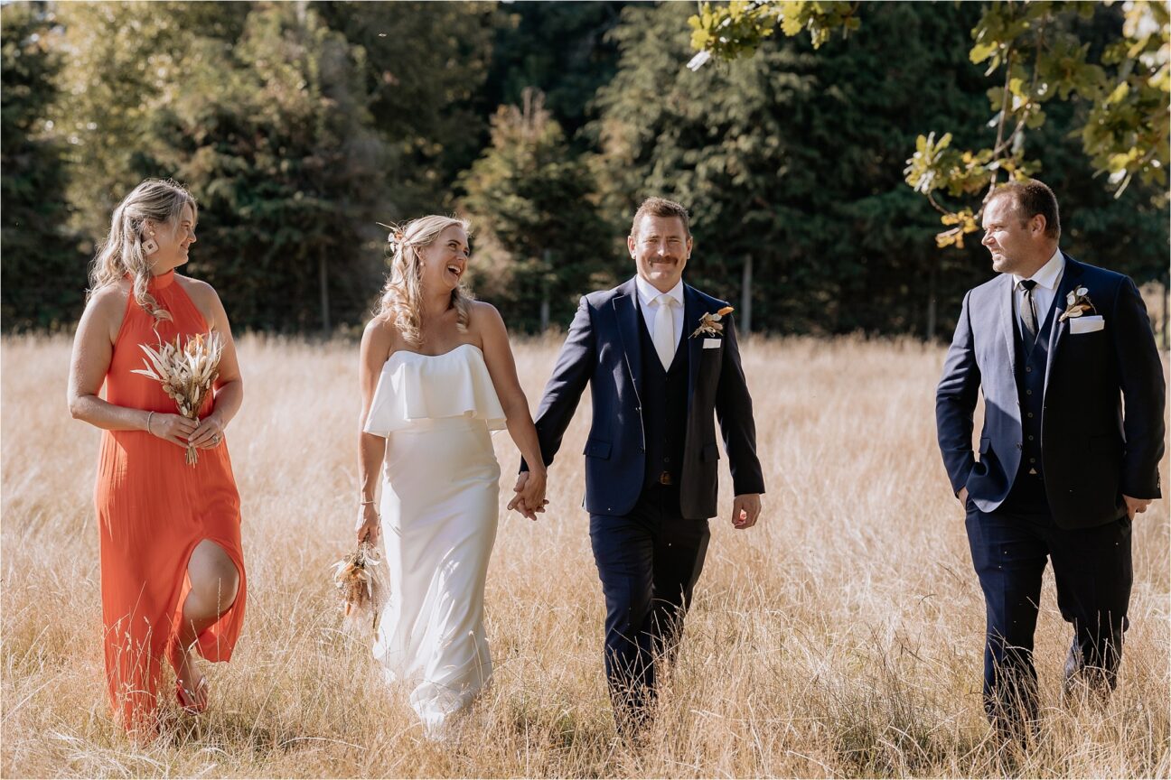 Wedding party walking in the deer paddock Ohakune