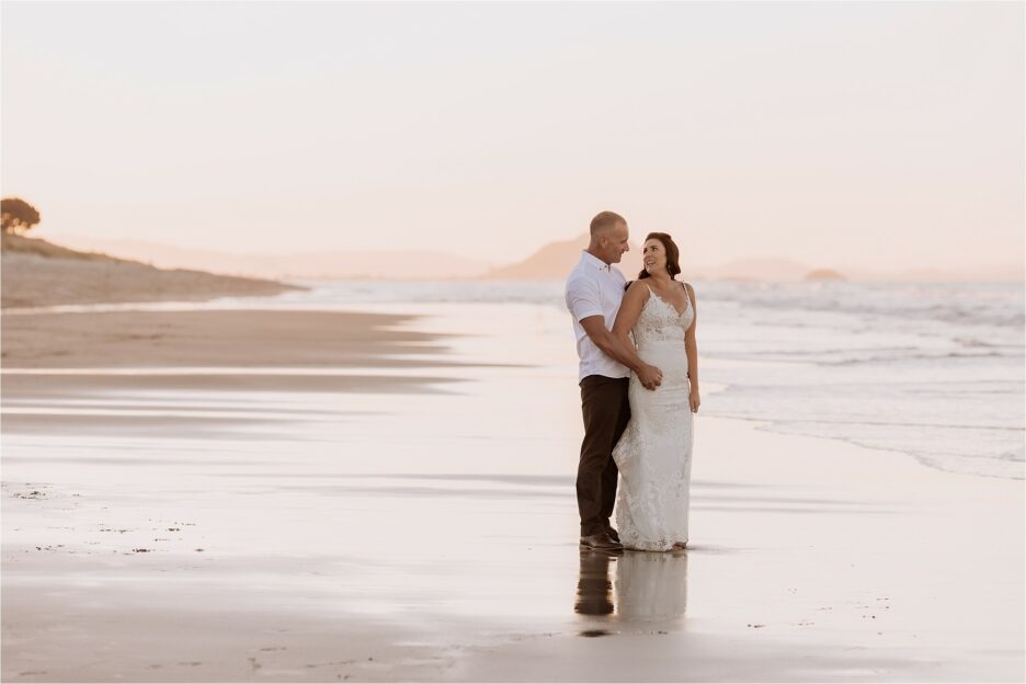 wedding photos on Papamoa beach at sunset