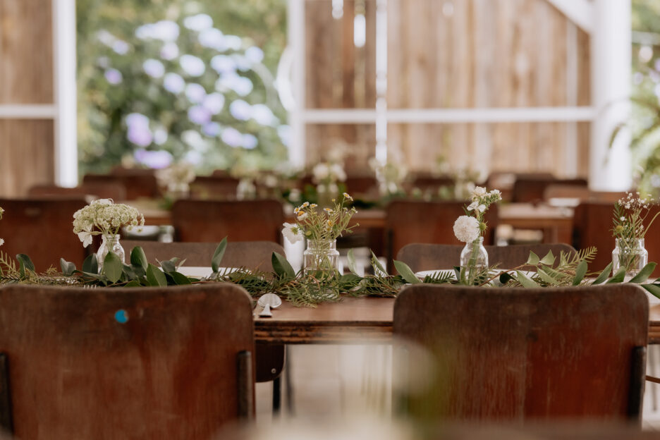 Flowers on wedding tables at Old Forest School