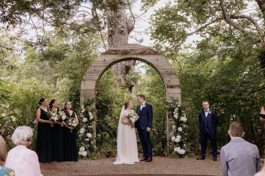 Wedding ceremony in progress with wedding celebrant at Old Forest School