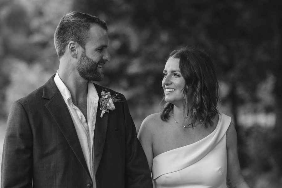 Black and white candid photo of bride and groom Whakatane