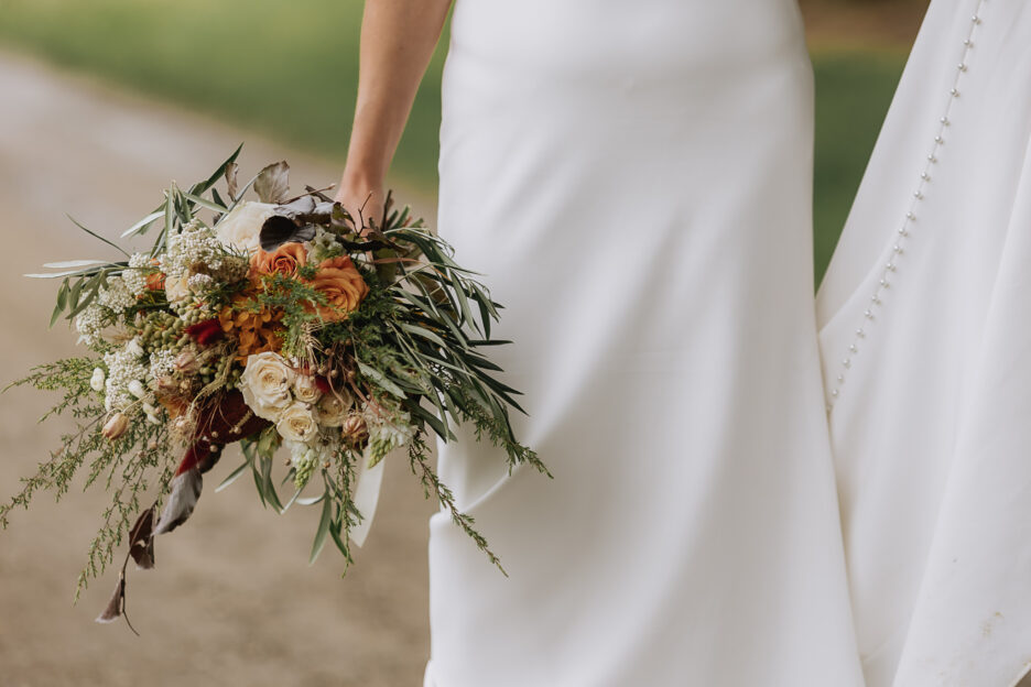 Brides autumn themed flower bouquet by the heirloom florist