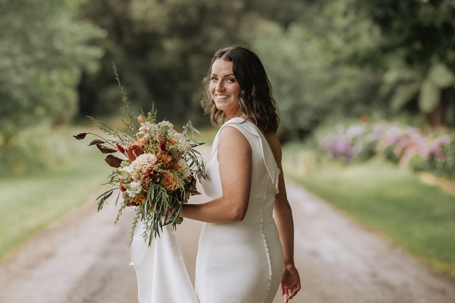 Bride turning looking at camera at the Run Venue Whakatane