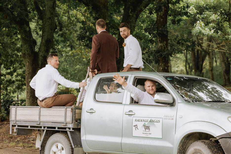 Groomsmen on back farm yute