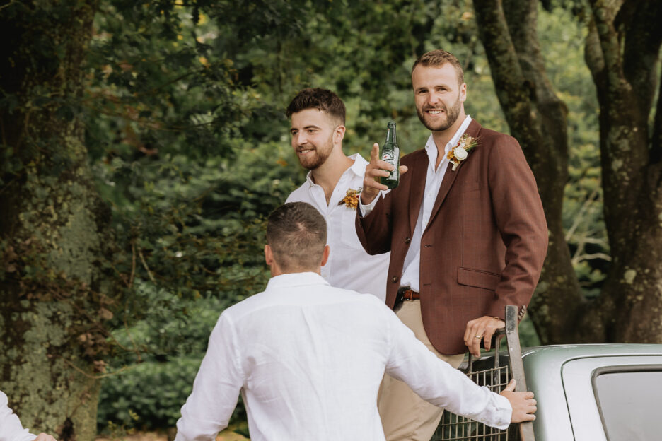 Groom with boys on farm yute at The Run Venue NZ