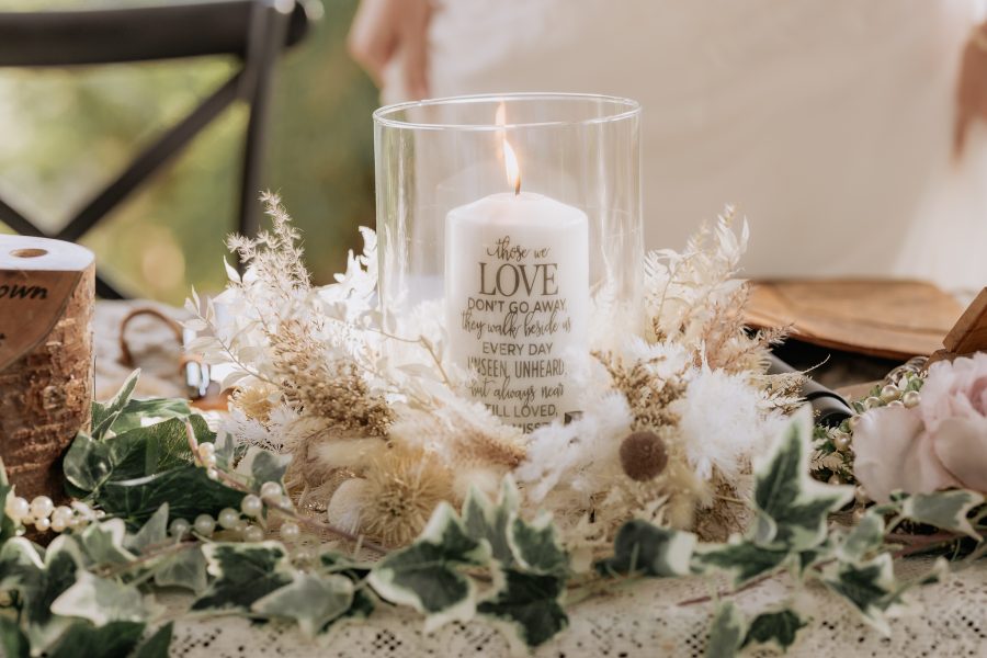 Candle lit for loved ones during ceremony