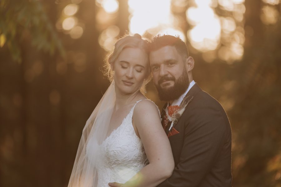 Wedding photography at Falls Retreat garden taken at golden hour