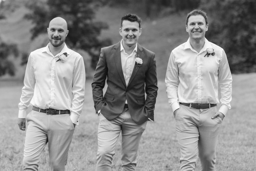 Happy black and White photo of boys walking in the countryside