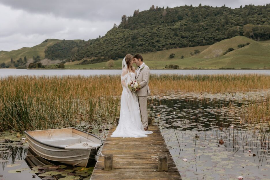 Wedding photos taken on the wharf on Lake Okareka