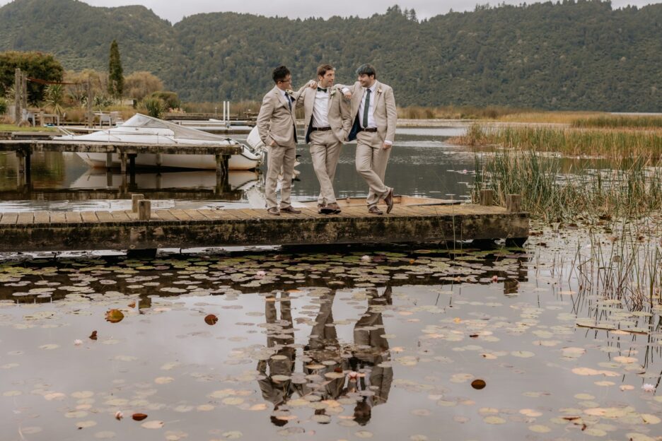 Groom with his men on wharf on Lake Okareka NZ