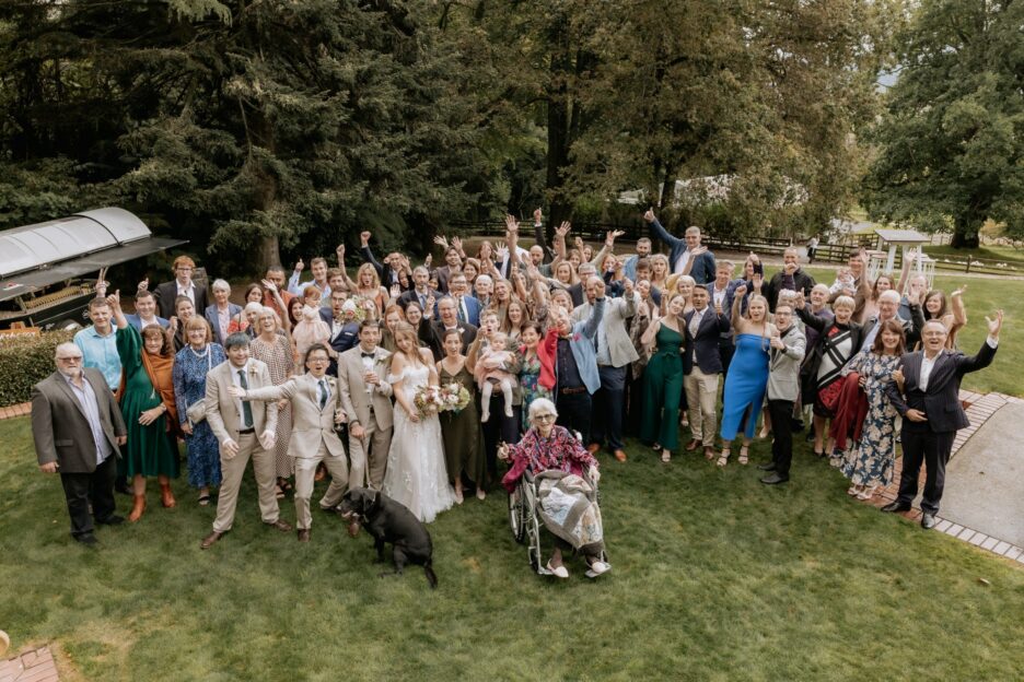 wedding guests waving outside New Zealand Wedding