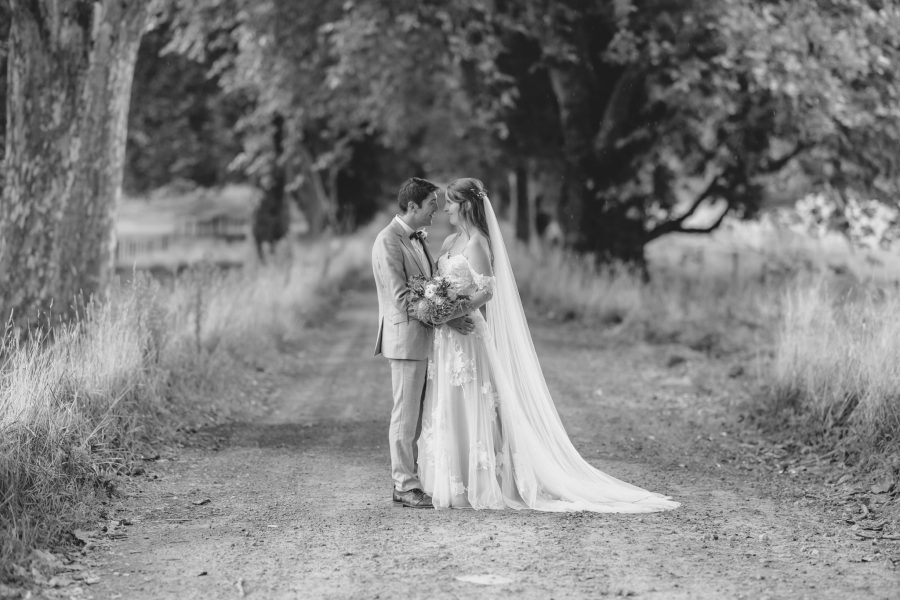 black and white photo of bride and groom at Longfords Estate