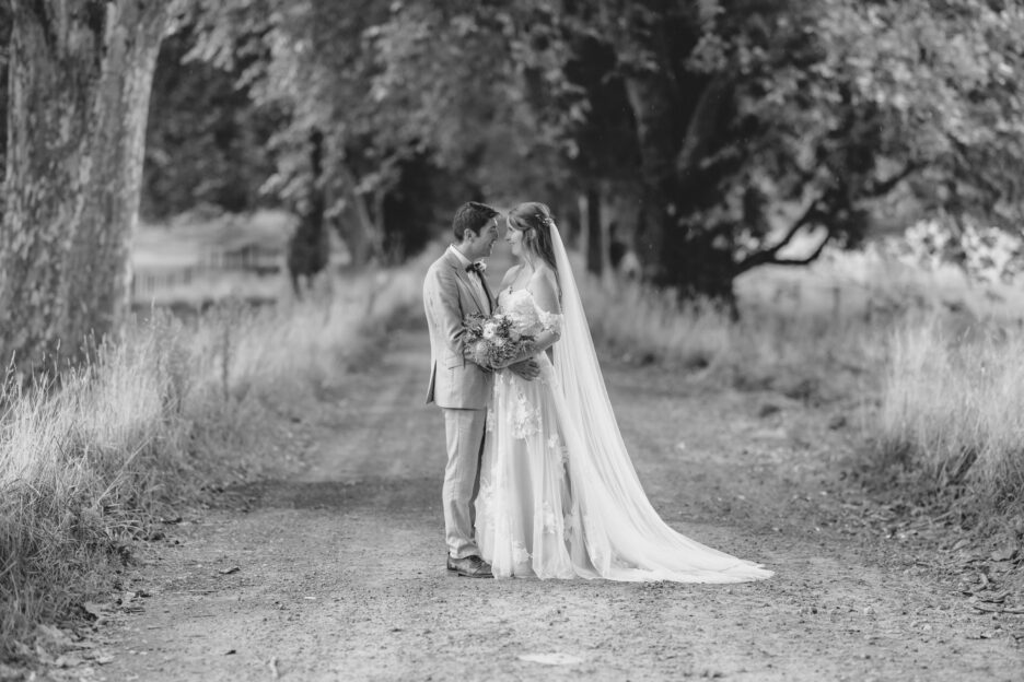 black and white photo of bride and groom at Longfords Estate