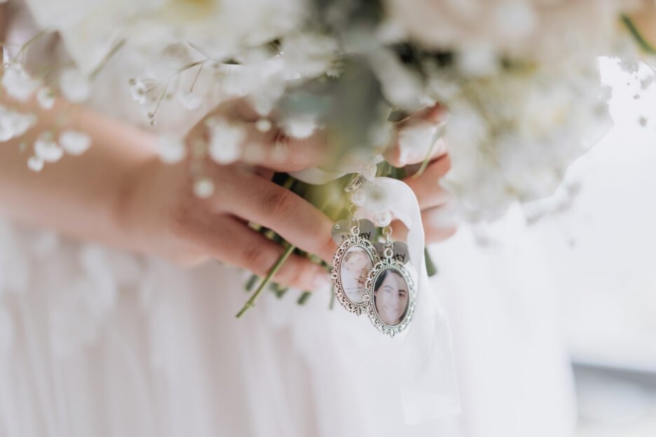 wedding bouquet with frames of loved ones