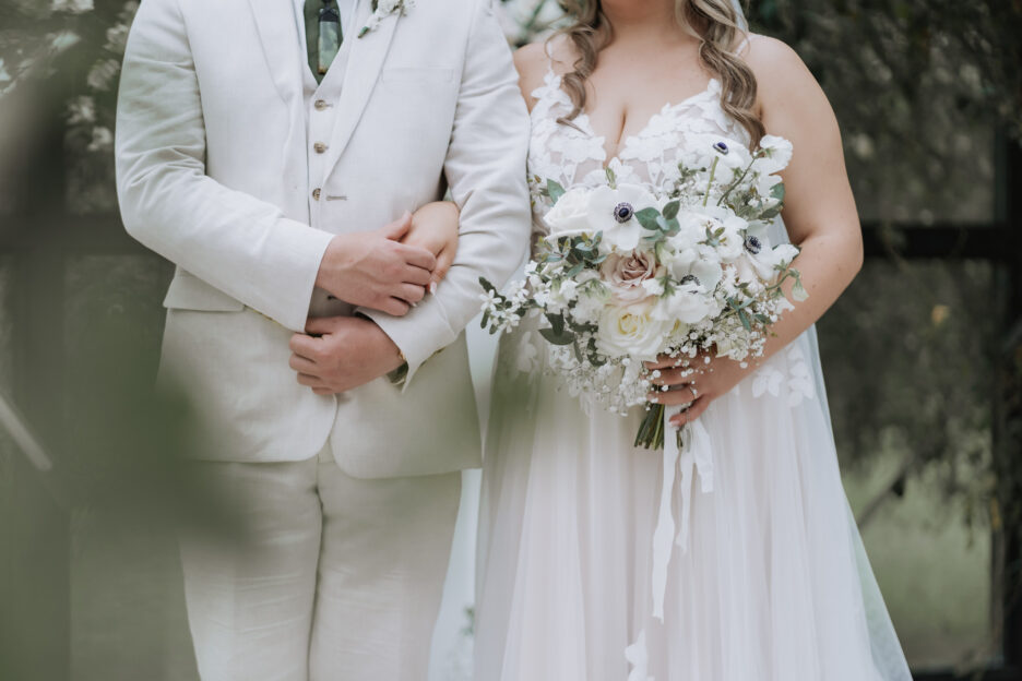 close up of hands while getting married