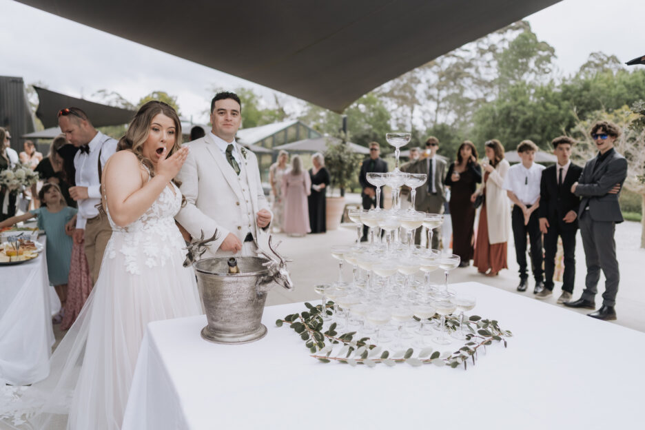 Bride gets surprise at champagne bottle explodes