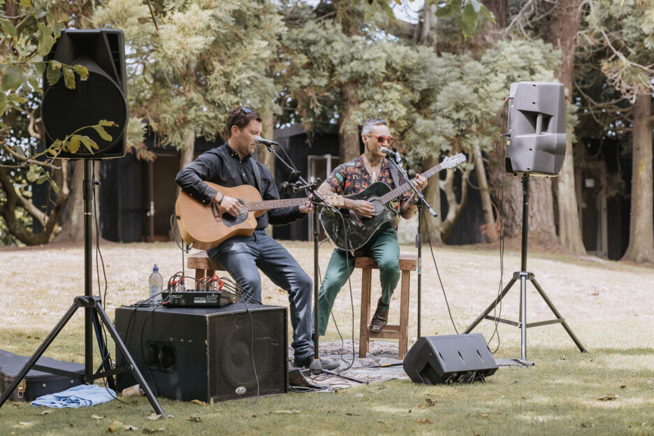 Tiki Tane and musicians playing music at Te Tumu wedding