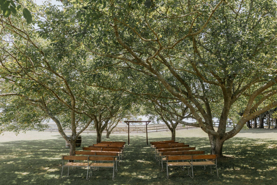 Te Tumu Estate Wedding ceremony area with bench seats