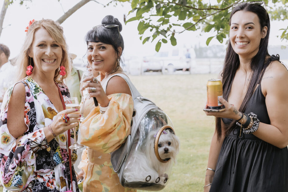 wedding guest with doggy back pack