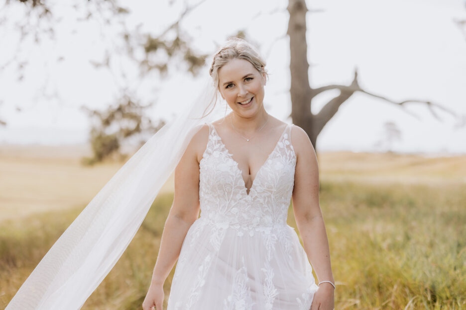 Bride smiling during photos Te Tumu Estate Papamoa