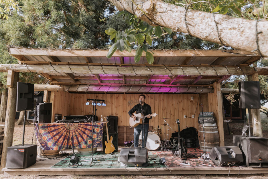 Musician playing at Te Tumu Estate stage wedding venue