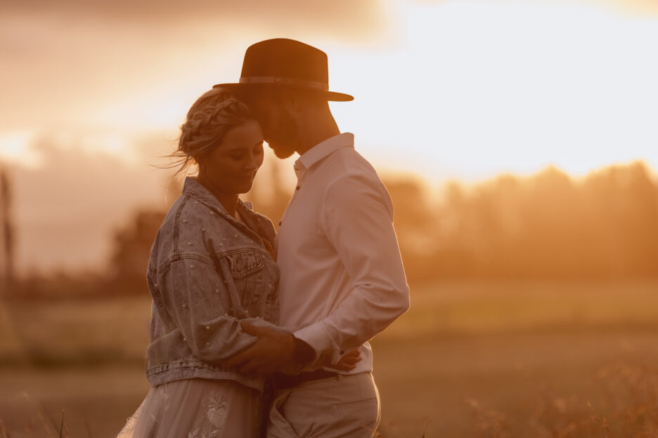 intimate moment with bride and groom at golden hour photography