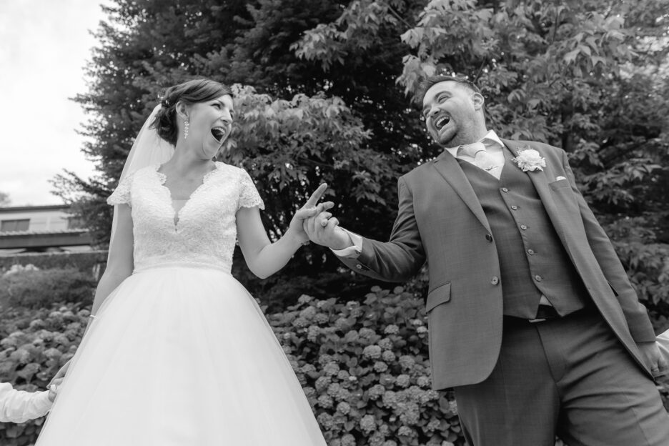 mum and dad laughing walking