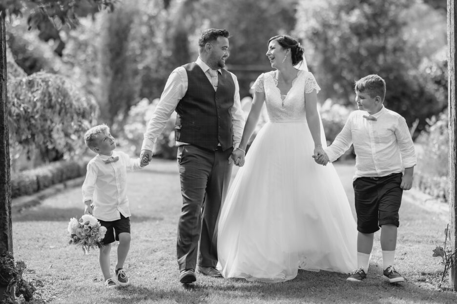 walking family photo at villa vie with pure images