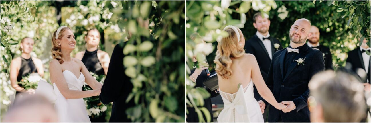 bride and groom laughing during ceremony black walnut glass house