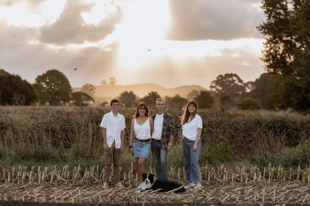 Family photo in cornfield for what to wear article for photos