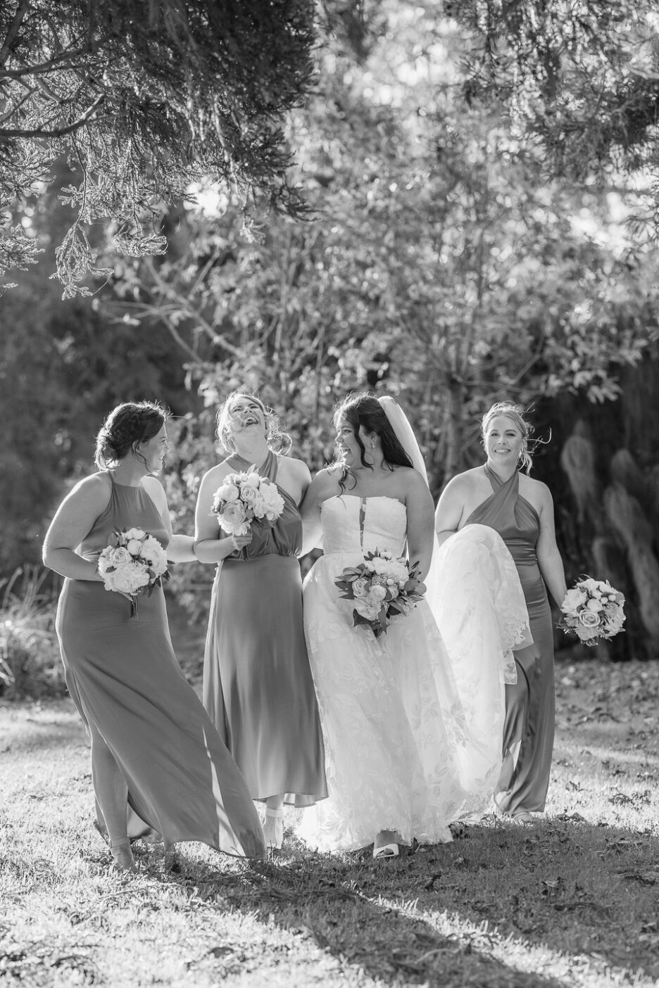 happy laughing bridesmaids with bride