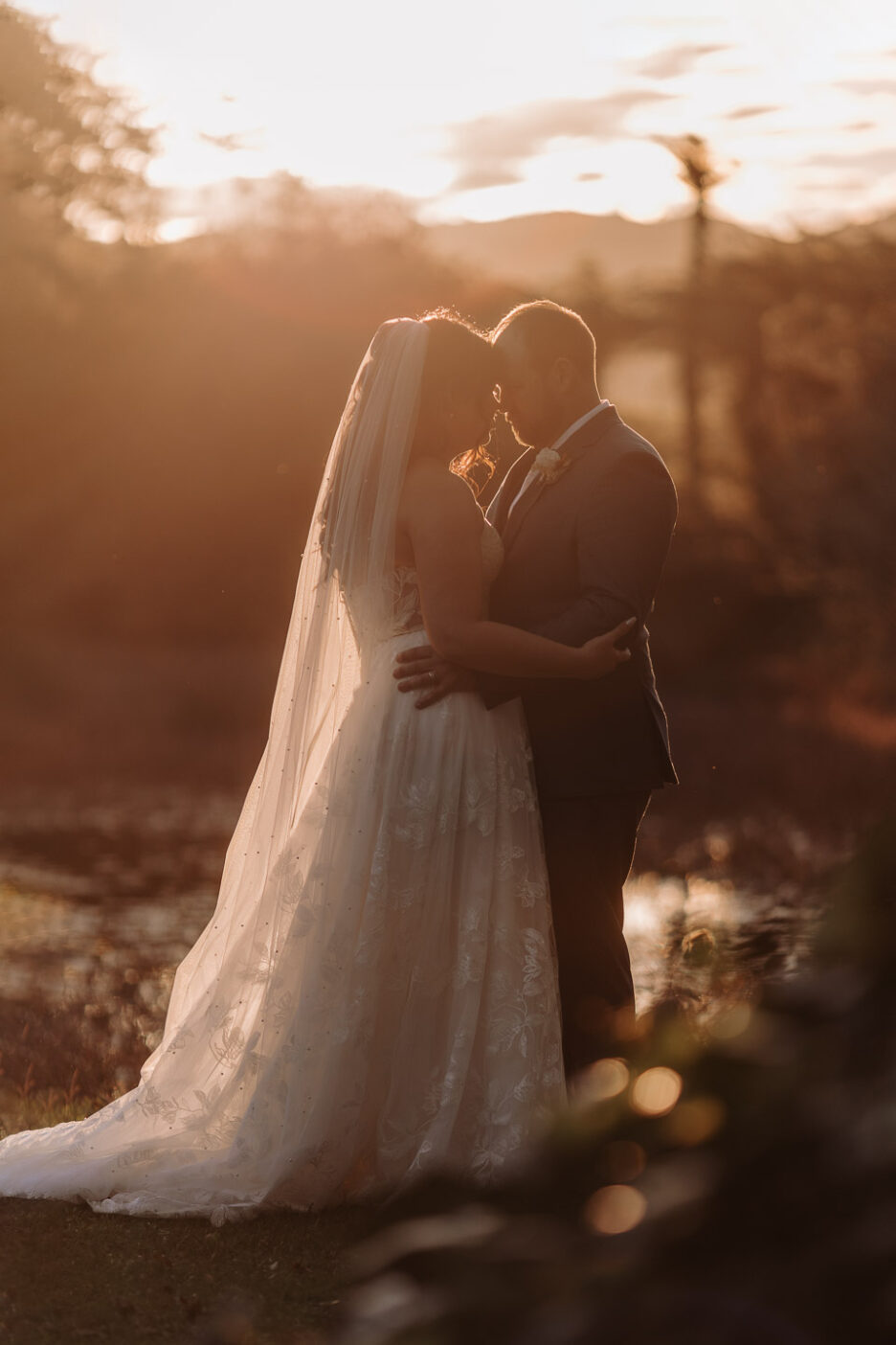 wedding photos taken at golden hour at Waterlily gardens Waihi with Pure Images Photography
