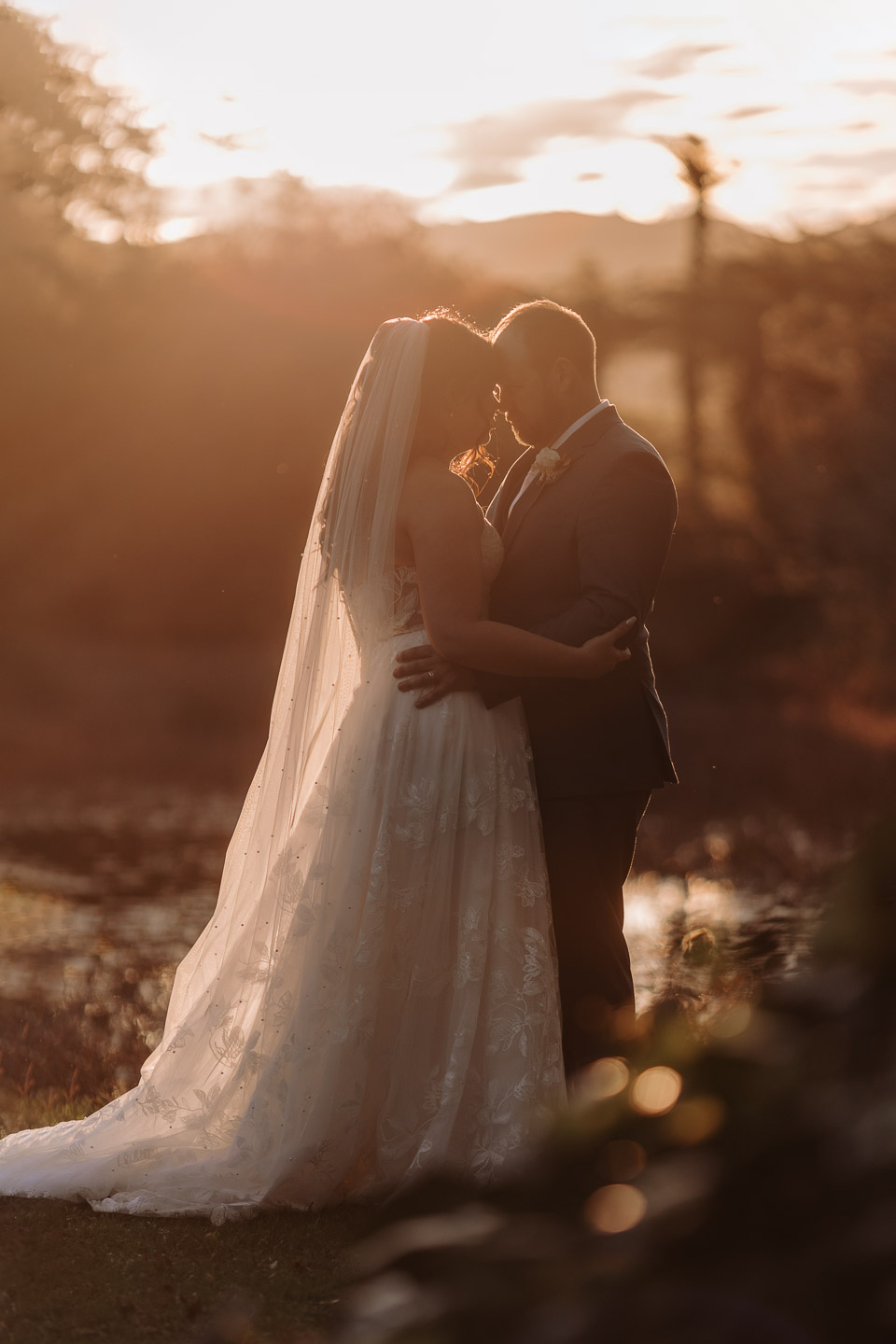 wedding photos taken at golden hour at Waterlily gardens Waihi with Pure Images Photography