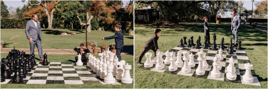 Groom and sons playing lawn chess at waterlily garden wedding venue